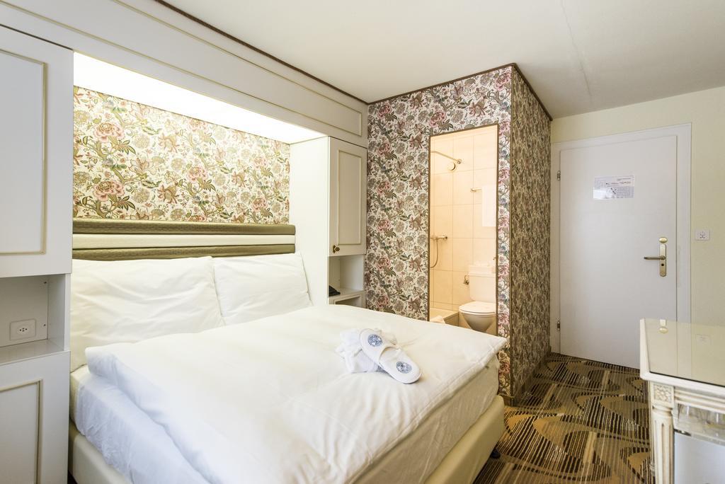 Posthotel Holiday Villa Arosa Zimmer foto